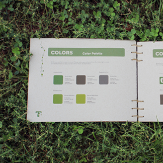 burrow brand standards booklet opened to the color guidelines pages